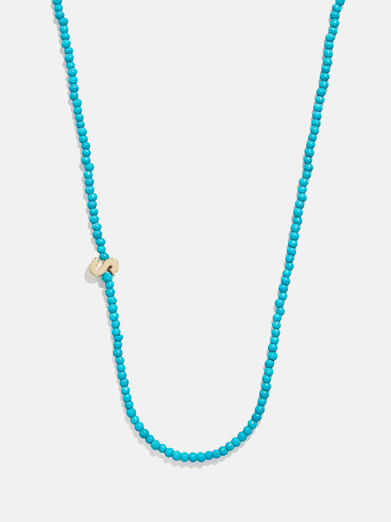 BaubleBar S - 
    Asymmetrical beaded initial necklace
  
