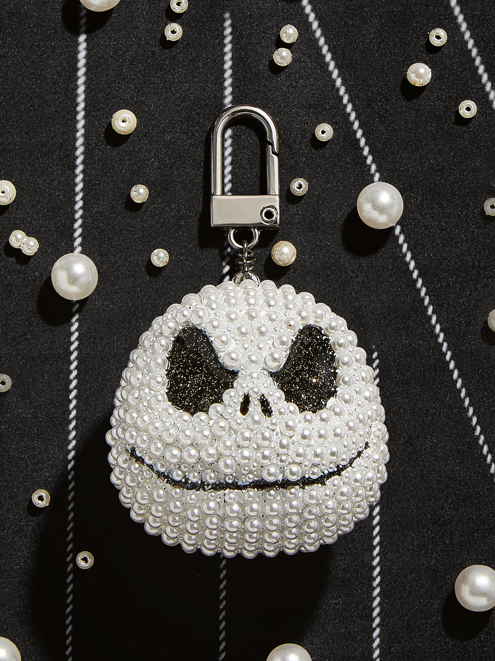 Nightmare Before Christmas Jewelry Bag Charms BaubleBar nightmare-before-christmas-jewelry-bag-charms-baublebar