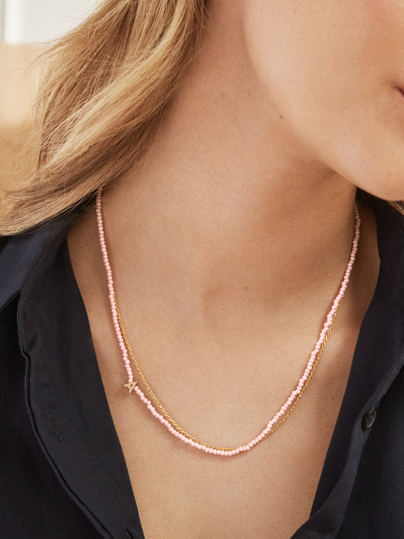 BaubleBar Rose Quartz Semi-Precious Initial Necklace - Rose Quartz - 
    Asymmetrical beaded initial necklace
  

