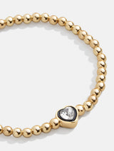BaubleBar Black - 
    Heart gold beaded bracelet
  
