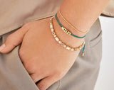 BaubleBar Custom Cord Bracelet - Dark Green -
Custom nameplate bracelet