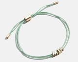 BaubleBar Custom Cord Bracelet - Mint -
Custom nameplate bracelet