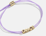 BaubleBar Custom Cord Bracelet - Lavender -
Custom nameplate bracelet