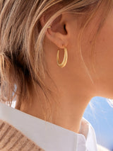 BaubleBar Audrey Earrings - Gold -
Gold hoop earrings