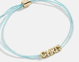 BaubleBar Custom Cord Bracelet - Neon Blue -
Custom nameplate bracelet