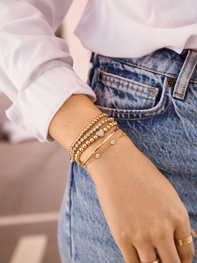 BaubleBar Heart Of Gems Pisa Bracelet - Clear/Gold - 
    Heart beaded stretch bracelet
  
