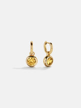 BaubleBar 18K Gold Birthstone Drop Earrings - Topaz -
18K gold plated sterling silver, Cubic Zirconia