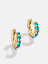 BaubleBar 18K Gold Birthstone Huggie Earrings - Blue Zircon -
Cubic zirconia earrings