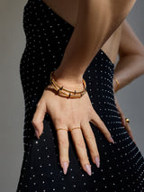 BaubleBar Eve Cuff Bracelet - Gold/Black - 
    Gold pavé coil bracelet