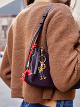 BaubleBar Disney Toy Story Pixar 2D Bag Charm - 2D Woody -
Toy Story Keychain