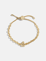BaubleBar A - 
    Gold chucky initial pull-tie bracelet