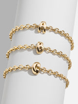 BaubleBar  - 
    Gold chucky initial pull-tie bracelet