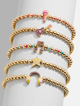BaubleBar Amped Up Kids' Pisa Bracelet Set - Headphones -
Five gold beaded stretch bracelets