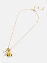 BaubleBar Disney Pluto Cluster Charm Necklace - Pluto - 
    Gold chain statement necklace