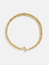 BaubleBar Zodiac Pisa Bracelet - Capricorn - 
    Gold beaded bracelet