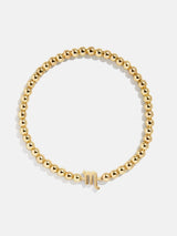BaubleBar Zodiac Pisa Bracelet - Scorpio - 
    Gold beaded bracelet