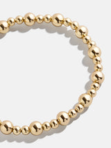 BaubleBar Florence Pisa Bracelet - 4MM/6MM Gold Pisa -
Gold beaded stretch bracelet