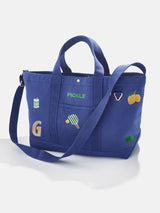 BaubleBar Navy -
Hand select 6 icons to personalize your tote