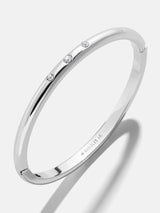 BaubleBar Nadia Classic Hinge Bangle - Classic Thin Silver Triple Bezel -
Silver bangle
