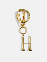 BaubleBar Gold Initial Enamel Bag Charm - H - 
    Initial keychain