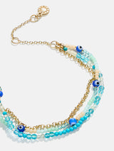 BaubleBar Rowan Semi-Precious Layered Bracelet - Mykonos -
Blue and gold bracelet with multiple chains