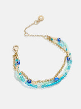 BaubleBar Rowan Semi-Precious Layered Bracelet - Mykonos -
Blue and gold bracelet with multiple chains