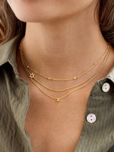 BaubleBar 18K Gold Asymmetrical Star of David Necklace - Star of David -
Cubic zirconia, 18K gold plated sterling silver