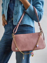 BaubleBar Disney Daisy Duck Motif Bag Charm - Daisy Duck -
Gold chain bag charm with Daisy Duck motifs