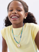 BaubleBar Lil' Peacemaker Kids’ Locket Necklace - Peace Sign -
It's Black Friday Week: Enjoy 20% off.