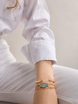 BaubleBar Evil Eye Reversible Bracelet - Gold/Turquoise -
Reversible blue and pavé evil eye bracelet
