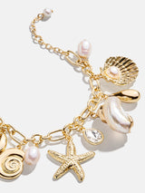 BaubleBar Isla Charm Bracelet - Gold/Pearl -
Shell and pearl charm bracelet