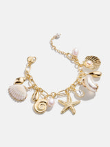 BaubleBar Isla Charm Bracelet - Gold/Pearl -
Shell and pearl charm bracelet