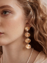 BaubleBar Calypso Seashell Earrings - Gold/Pearl -
Gold statement earrings with pearls