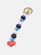 BaubleBar Carry Love Bag Charm - Blue -
Beaded heart bag charm