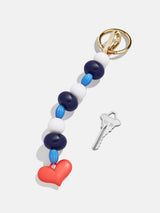 BaubleBar Carry Love Bag Charm - Blue -
Beaded heart bag charm