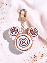 BaubleBar Disney Mickey Mouse Cinnamon Roll Bag Charm - Disney Cinnamon Roll Bag Charm -
Oversized Disney keychain