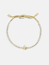 BaubleBar K -
Adjustable bracelet with glass stones
