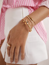 BaubleBar Disney Mickey & Minnie Mouse Kissing Cuff Bracelet - Mickey Mouse & Minnie Mouse - 
    Gold cuff bracelet