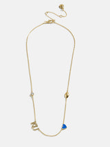 BaubleBar University of Kansas Spaced Charm Necklace - University of Kansas - 
    Gold necklace with University of Kansas charms