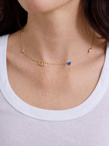 BaubleBar University of Kansas Spaced Charm Necklace - University of Kansas - 
    Gold necklace with University of Kansas charms