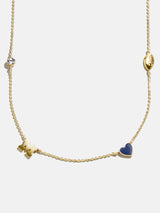 BaubleBar University of Michigan Spaced Charm Necklace - University of Michigan - 
    Gold necklace with University of Michigan charms