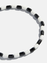 BaubleBar Brighten Up Enamel Beaded Bracelet - Licorice Twist -
Beaded stretch bracelet