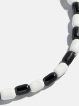 BaubleBar Brighten Up Enamel Beaded Bracelet - Licorice Twist -
Beaded stretch bracelet