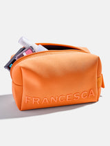 BaubleBar Tangerine -
Personalized jewelry pouch