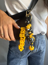 BaubleBar NFL Beaded Bag Charm - Pittsburgh Steelers - 
    Keychain charm for bag