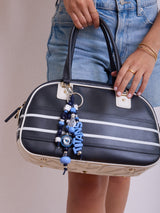 BaubleBar NFL Beaded Bag Charm - Tennessee Titans - 
    Keychain charm for bag