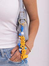 BaubleBar NFL Beaded Bag Charm - Los Angeles Chargers -
Keychain charm for bag