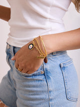 BaubleBar NFL Charm Bracelet - Pittsburgh Steelers - 
    Gold bracelet with charms