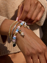 BaubleBar Disney Mickey Mouse & Minnie Mouse Nutcracker Charm Bracelet - Pink/Blue - 
    Beaded bracelet with charms
