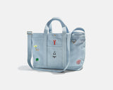 BaubleBar Light Denim -
Hand select 6 icons to personalize your tote